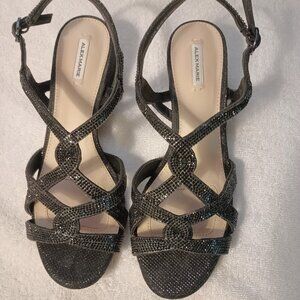Alex Marie Crennan black glitter sandals.